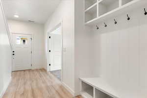 Mudroom featuring light hardwood / wood-style flooring