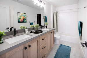 Upper Guest Bath,  home is to be built pictures are of home with similar finish and virtually staged