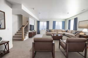 Basement rec room,  home is to be built pictures are of home with similar finish and virtually staged