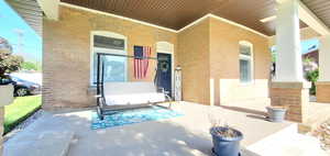 View of patio with a porch