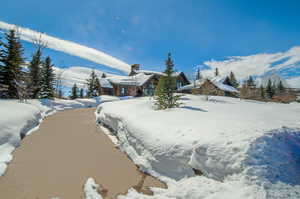 View of yard layered in snow