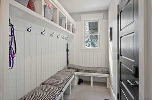 Mudroom with tile floors