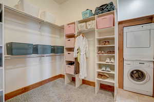 Master Closet with Stacked Washer and Dryer