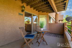 Covered back patio off dining room