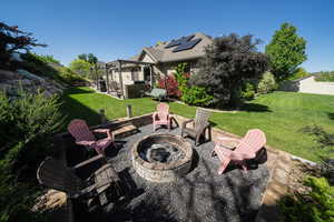 View of patio / terrace featuring a fire pit