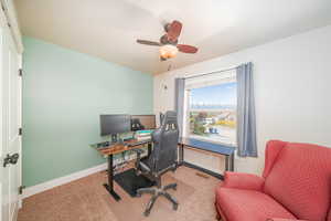 Office featuring carpet flooring and ceiling fan