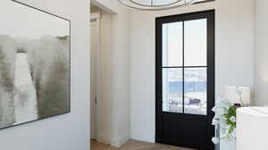 Entrance foyer featuring light wood-type flooring