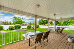 Wooden terrace with a yard