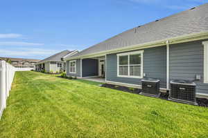 View of yard featuring central AC