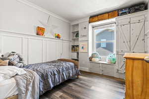 Bedroom #2 Upstairs featuring custom wood closet