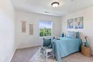 View of carpeted bedroom