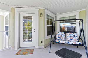 Entrance to property with covered porch