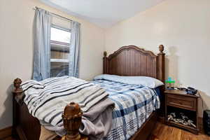 Bedroom featuring hardwood / wood-style floors