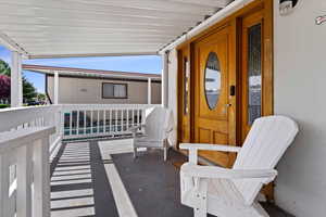 Balcony featuring french doors