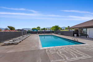 View of pool with a patio area