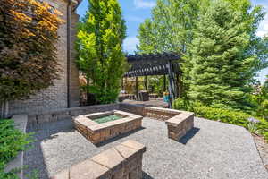 View of terrace featuring a pergola