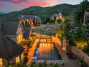 Pool at dusk with a mountain view