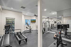 Exercise room featuring ceiling fan