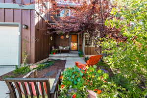 Property entrance featuring a garage