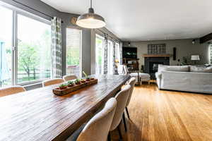 Dining area with hardwood / wood-style floors