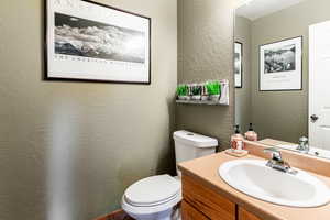 Bathroom with vanity and toilet