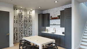 Interior space with sink and light hardwood / wood-style floors