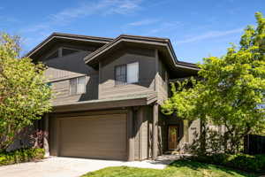 View of front of property featuring a garage