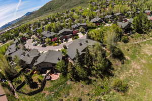 Birds eye view of property with a mountain view