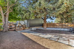 View of yard featuring a wooden deck