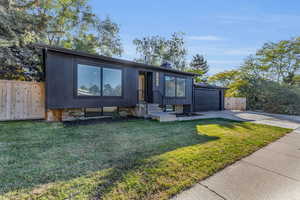 View of front of property featuring a front lawn