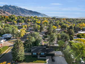 Birds eye view of property featuring a mountain view