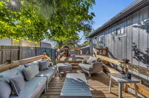 Wooden deck with an outdoor hangout area