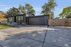 View of front of home featuring a garage