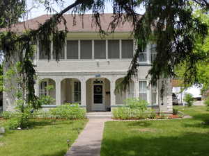 View of front of house featuring a front lawn