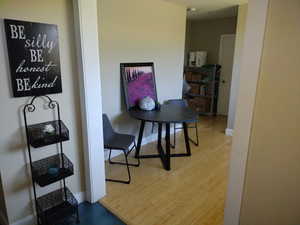 Dining room with wood-type flooring