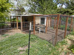 View of yard with an outdoor structure