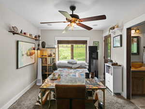 Bedroom featuring ceiling fan and great views