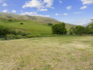 Property view of mountains featuring a rural view