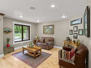 Sitting room with hardwood flooring