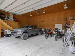 Garage featuring a garage door opener