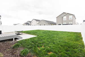 View of yard with a deck