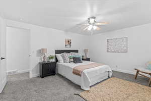 Bedroom with carpet flooring and ceiling fan