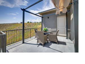 View of terrace featuring a balcony