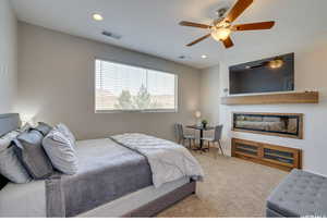 Bedroom with carpet floors and ceiling fan