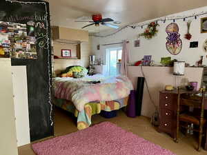 Bedroom featuring ceiling fan