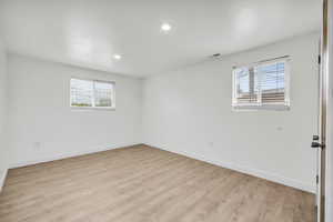 Empty room featuring light hardwood / wood-style flooring