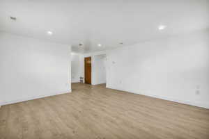 Spare room with light wood-type flooring