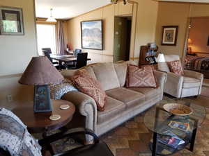 Living room with vaulted ceiling