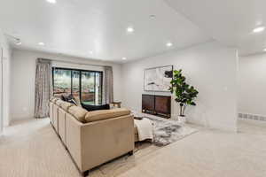 Living room with light colored carpet