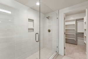 Bathroom featuring an enclosed shower